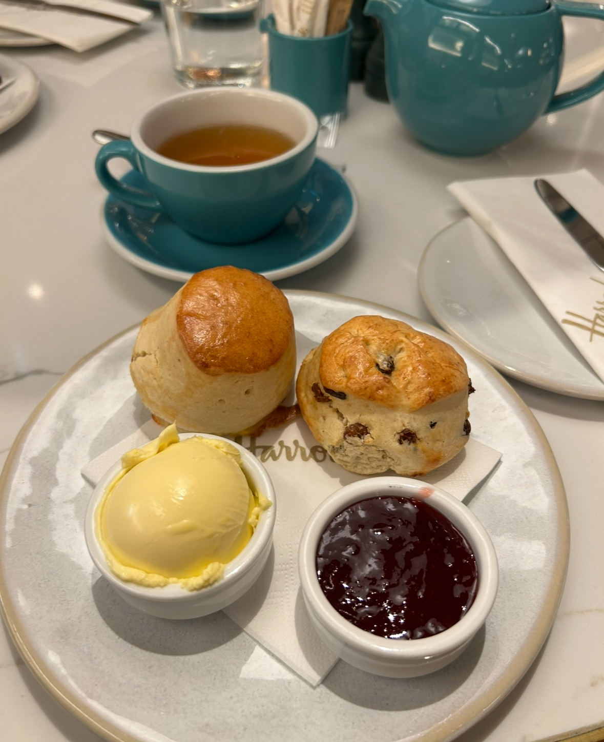 Cream tea at Harrod's cafe London England.